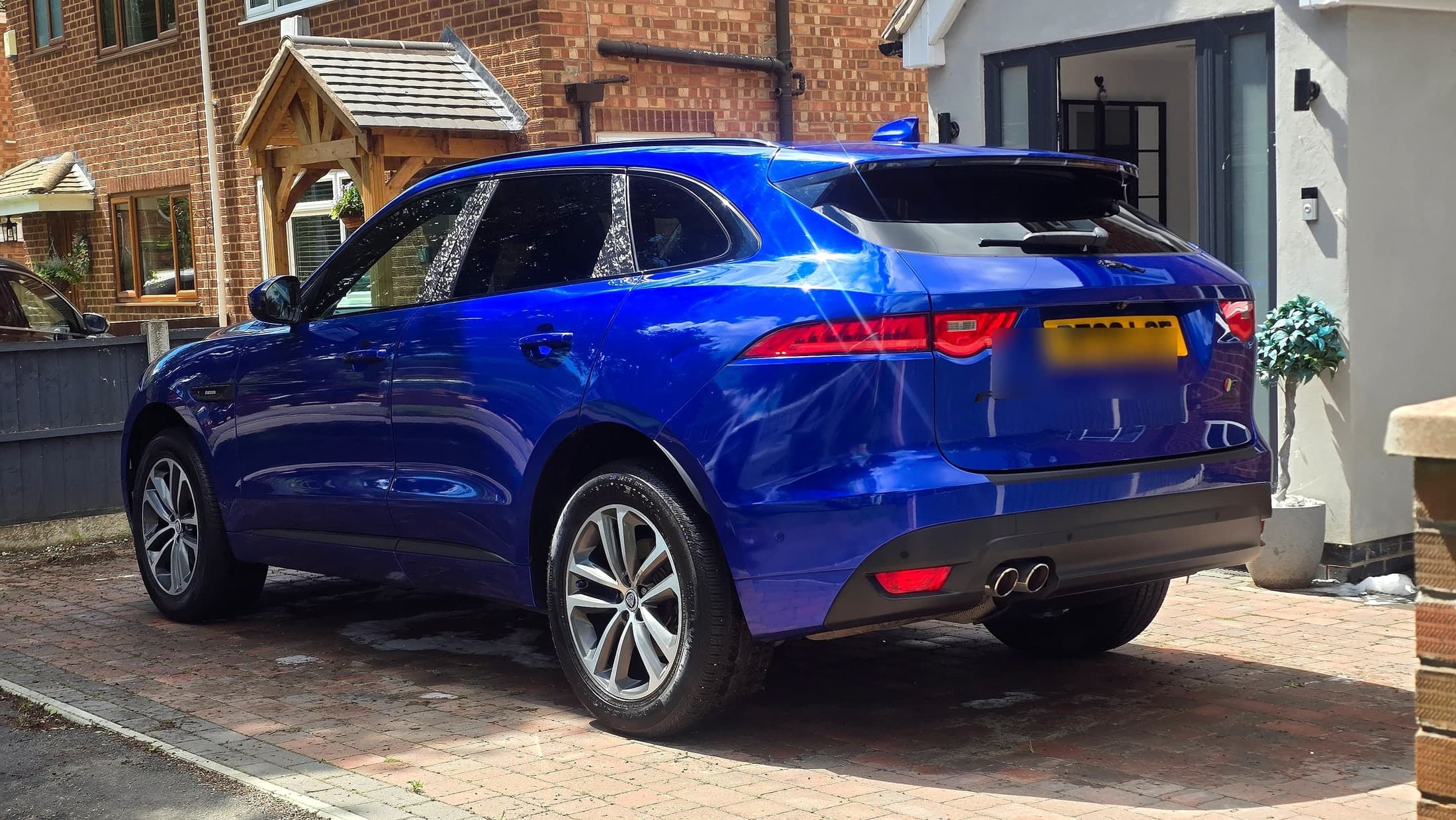 Blue Jaguar F-Pace gleaming after a full Deep Clean by Blue Horizon Detailing in Rugby, Warwickshire