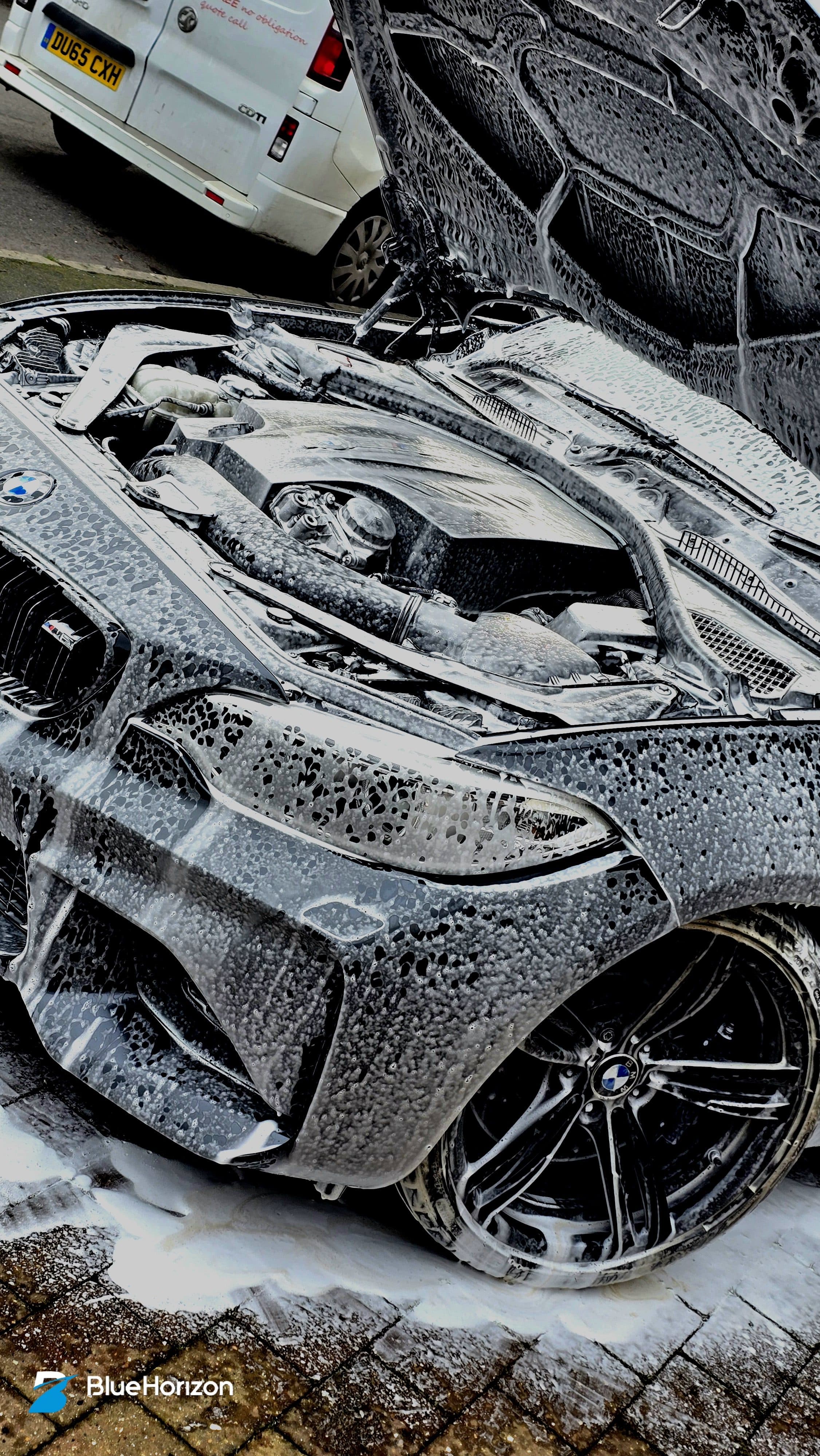 BMW M4 covered in snow foam during Blue Horizon Detailing wash and decontamination stage, Warwickshire mobile detailing
