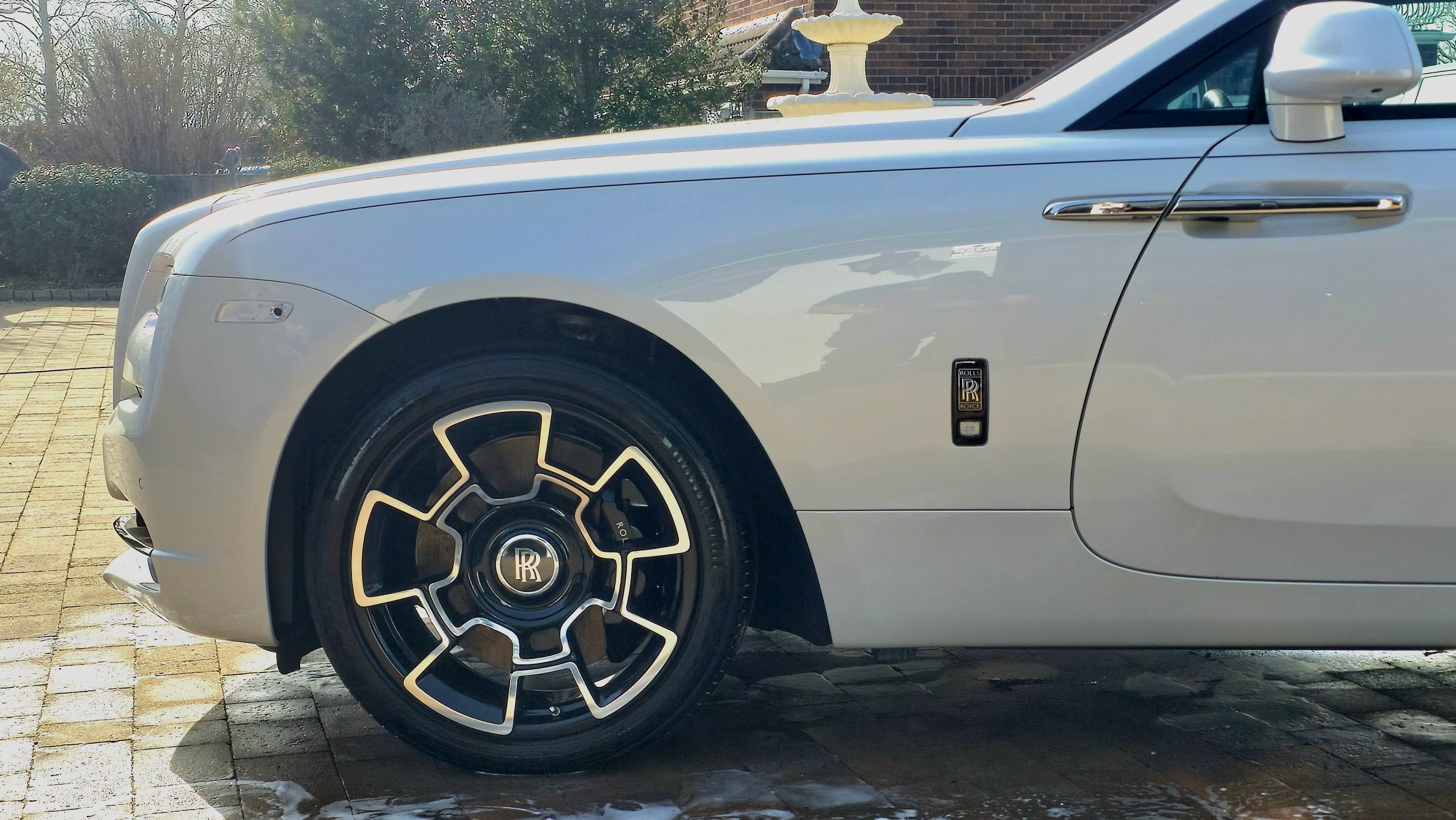 Rolls-Royce Ghost Black Badge alloy wheel dressed after deep clean — wheel detail Warwickshire