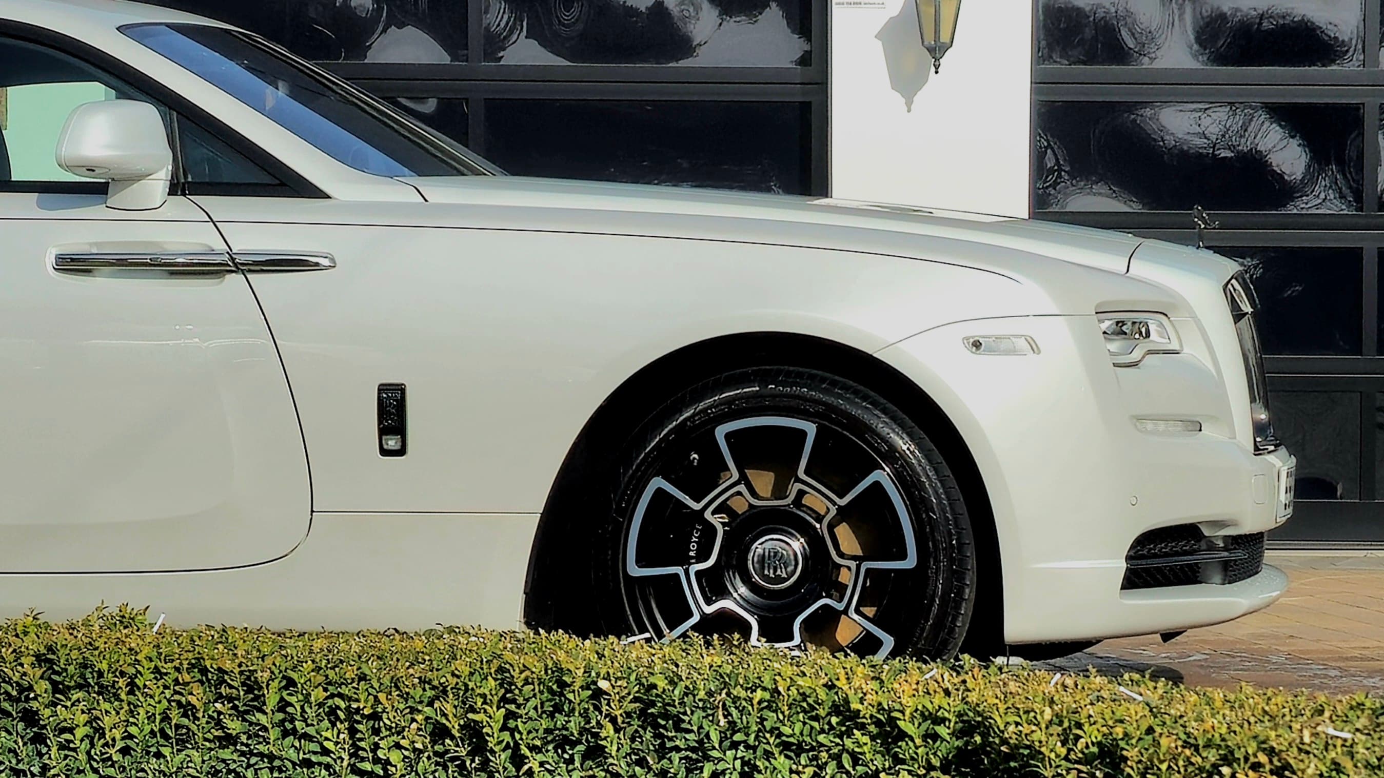 Rolls-Royce Ghost side panel showing flawless reflective paintwork after detailing by Blue Horizon Detailing, Warwickshire