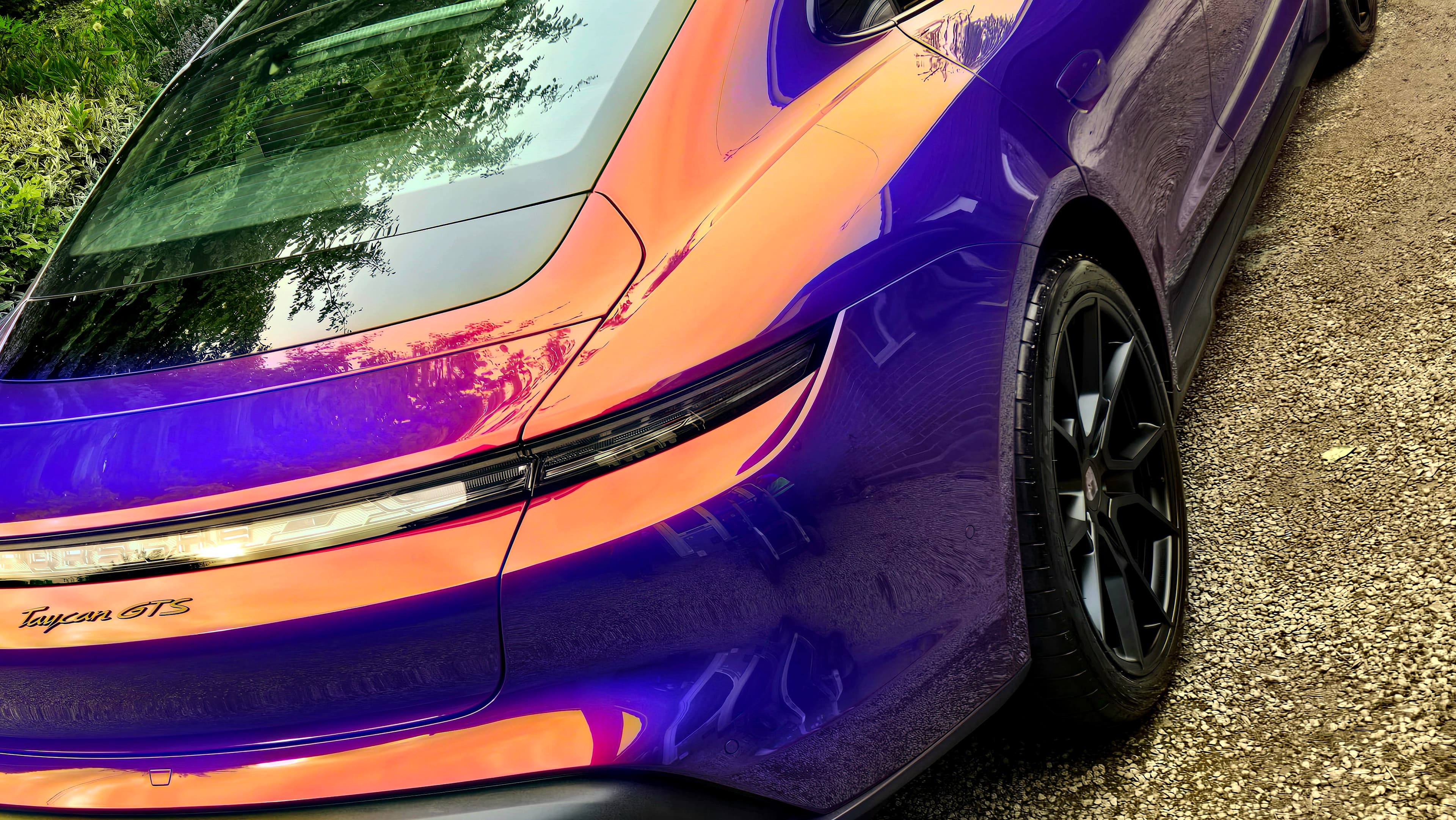 Porsche Taycan GTS rear badge and roofline showing deep gloss paint after ceramic coating, Warwickshire