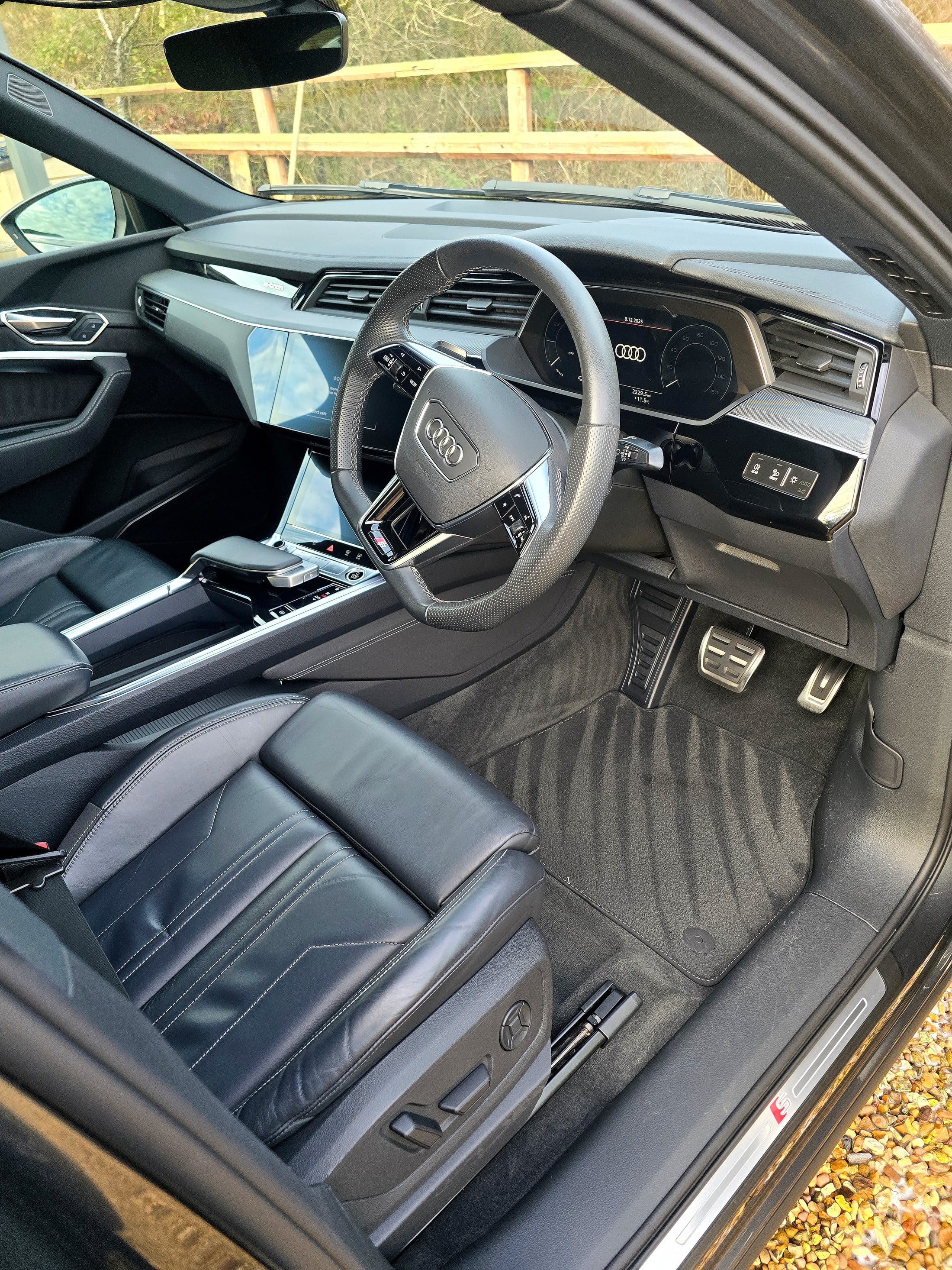 Clean Audi Q8 e-tron interior, dashboard and front seats after a valet